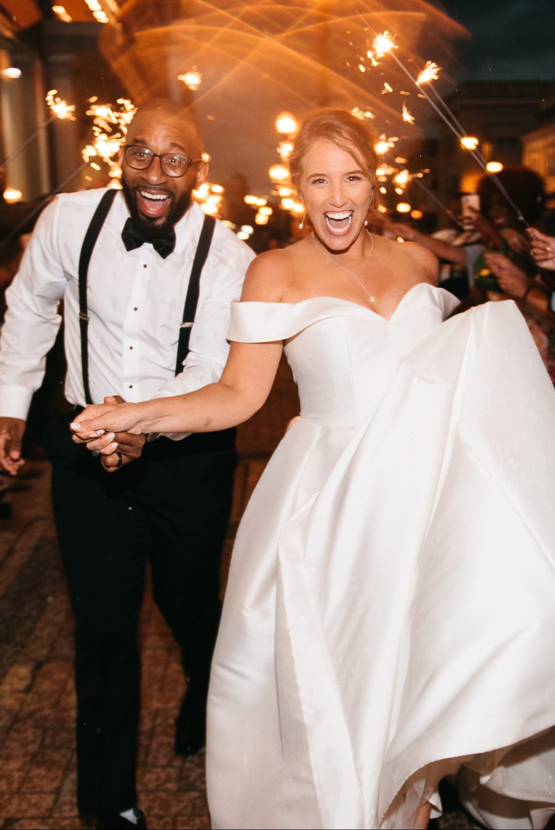 Couple's Sparkler Picture Outside Mercantile Hall